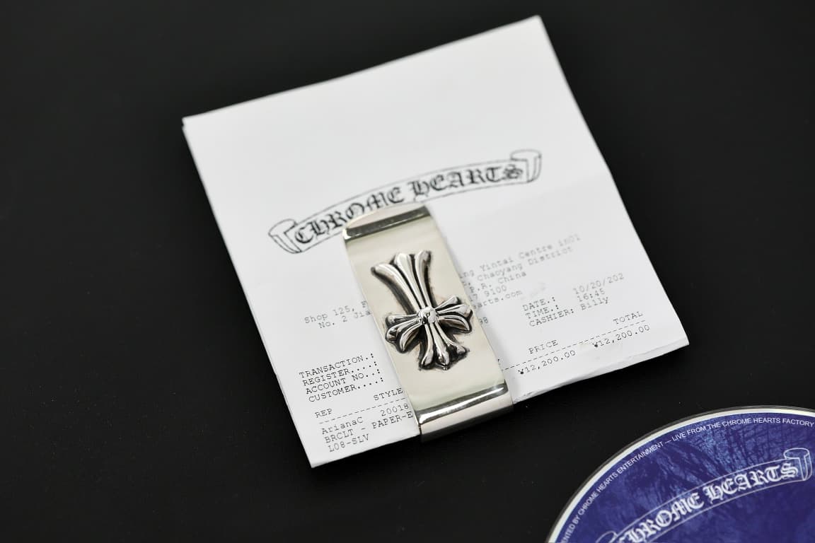 Серебряный зажим для купюр Chrome Hearts на фирменном буклете