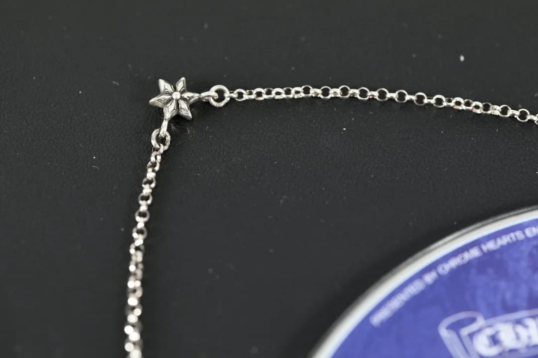 Фрагмент цепочки с подвеской в форме звезды колье Chrome Hearts