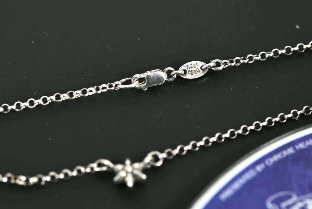 Замок и подвеска серебряного колье Chrome Hearts с гравировкой пробы