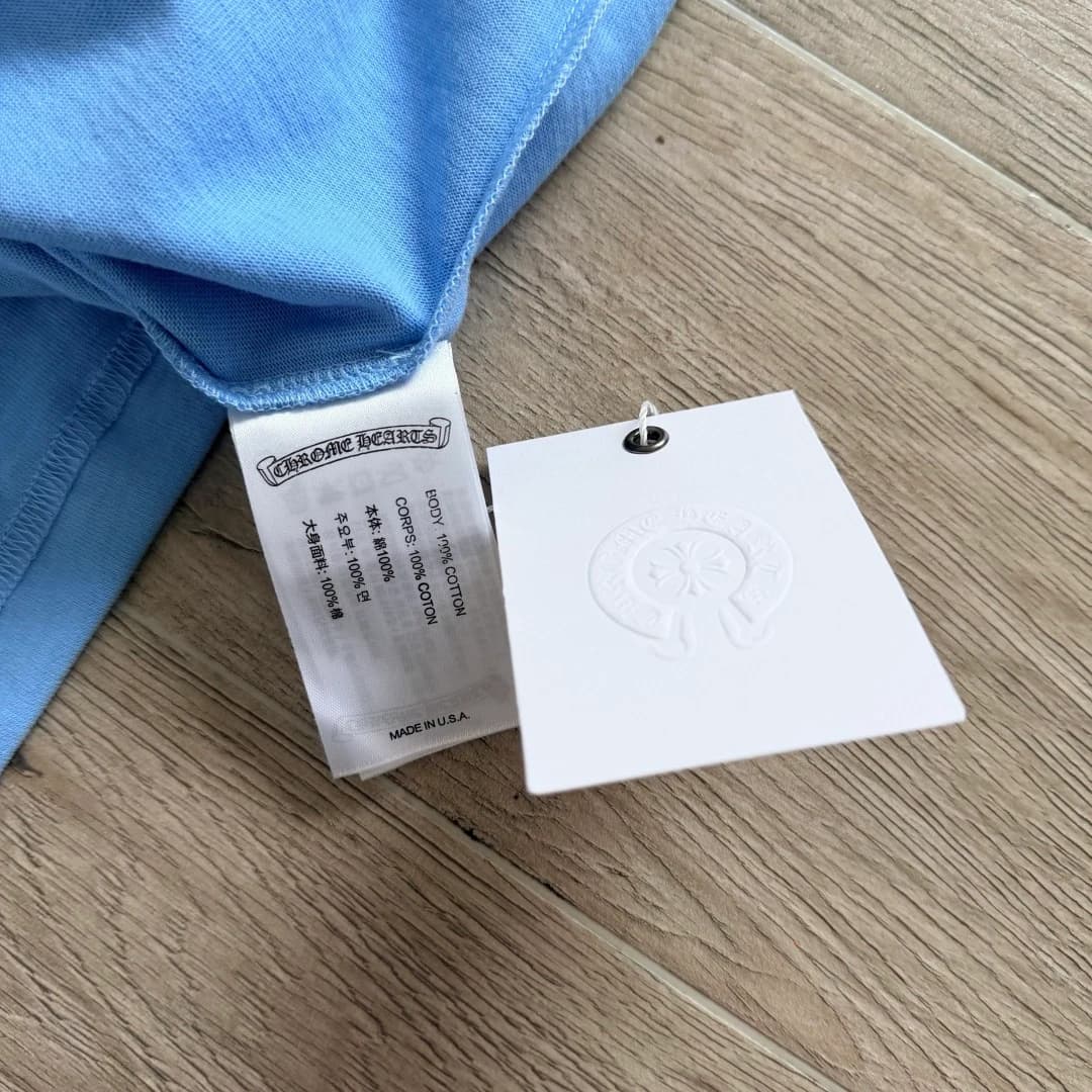 Бирка голубой футболки Chrome Hearts Miami