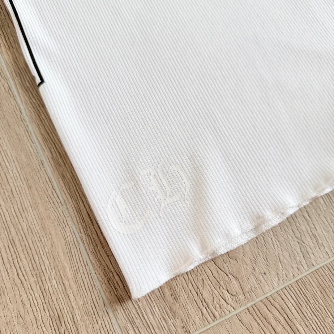 Деталь нижнего подгиба платья-майки Chrome Hearts