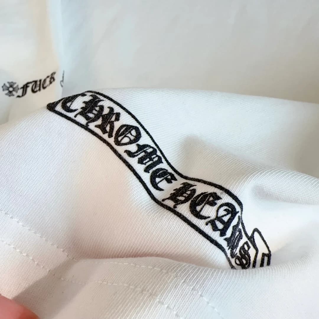 Принт с логотипом Chrome Hearts на нижней части лонгслива