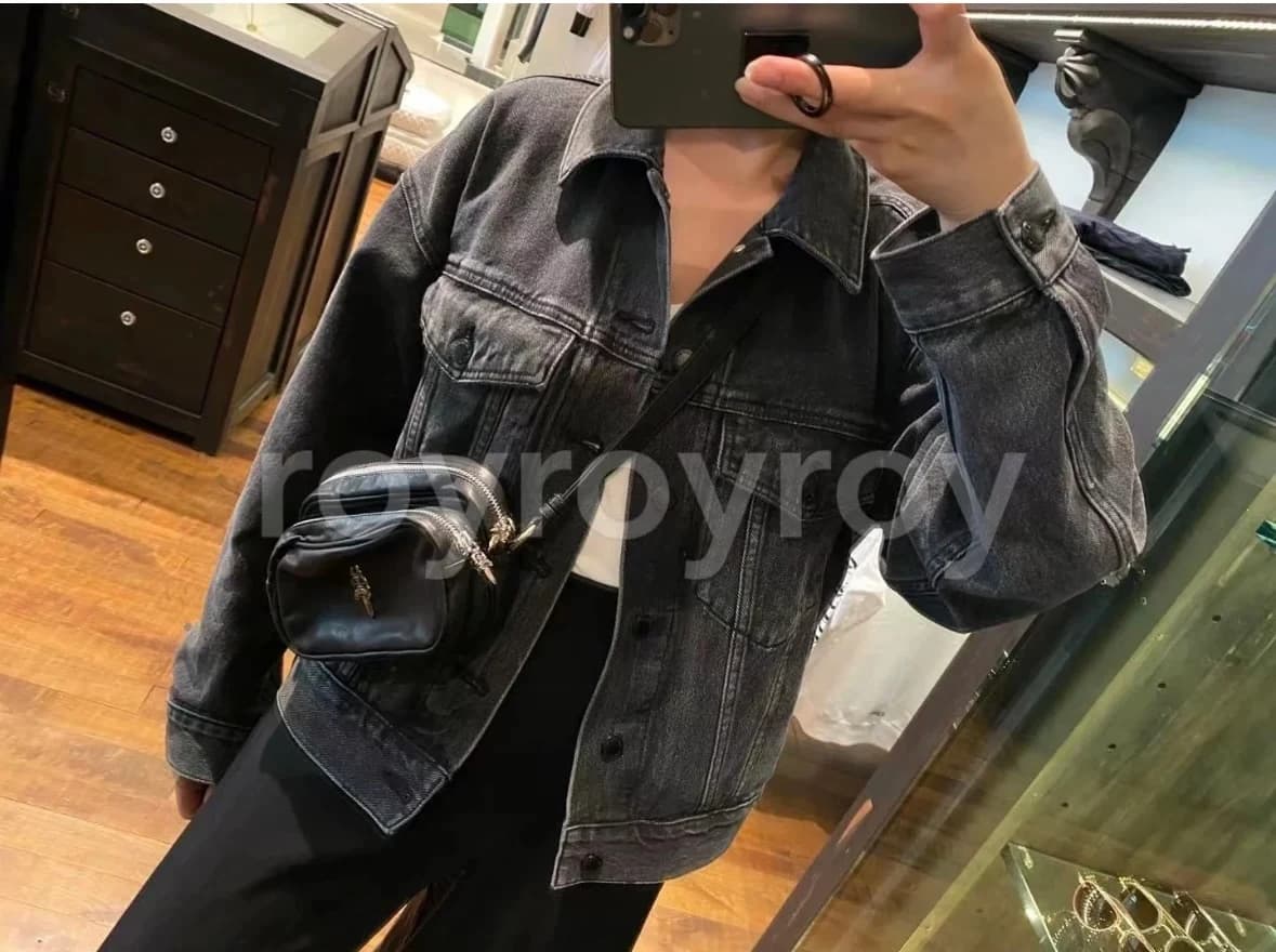Детализация швов на черной коже Chrome Hearts